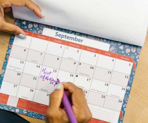 A calendar with a consistent workout schedule marked on it.